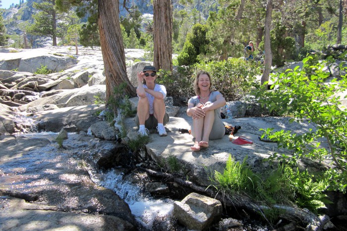 Two of our AAUW Gourmet Group Gals relax along Cascade Creek. (Photo by Michelle Portesi)